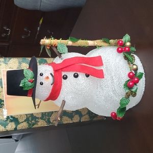 Plastic snowman that lights up